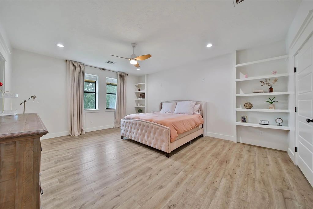 Bedroom with built-in shelving